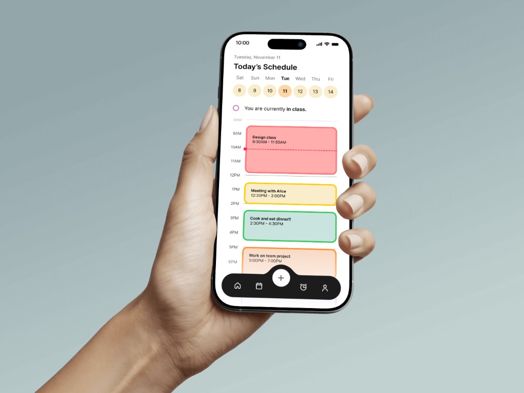 Fortune app – hand holding iPhone